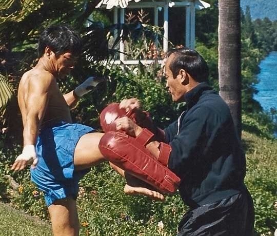Ajarn Chai Sirisute and Guro Dan Inosanto in the Early Days muay thai kick